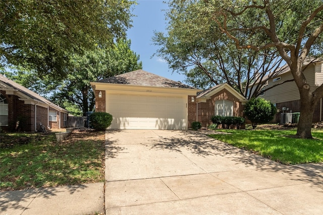 2512 Woodhaven Dr, Flower Mound, TX 75028 - view of front of property featuring brick siding, an attached garage, and concrete driveway