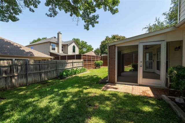2512 Woodhaven Dr, Flower Mound, TX 75028 - fenced backyard featuring a sunroom