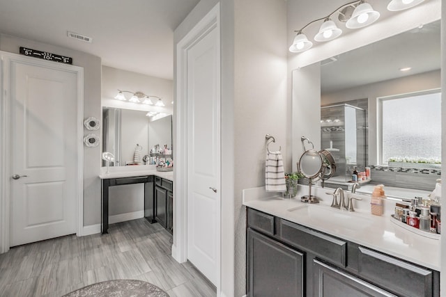 407 Emerson Dr, Rockwall, TX 75087 - bathroom featuring a stall shower and vanity