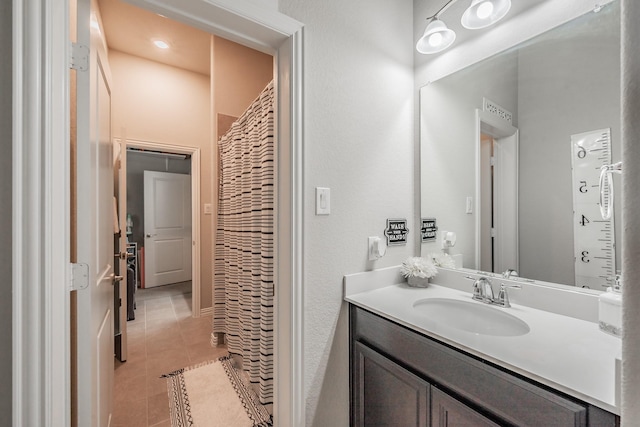 407 Emerson Dr, Rockwall, TX 75087 - bathroom with vanity, tile patterned floors, and a shower with shower curtain