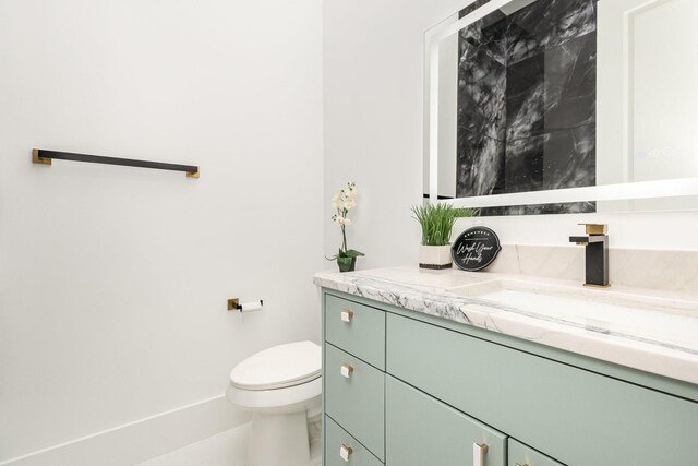 1022 Bow St, Rockwall, TX 75087 - bathroom featuring vanity and toilet