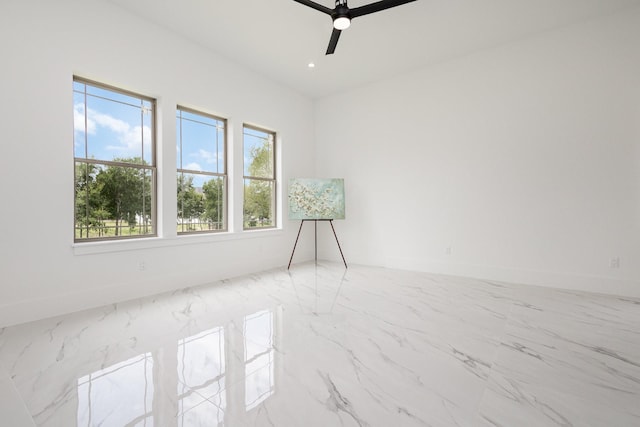 1022 Bow St, Rockwall, TX 75087 - empty room with marble finish flooring, a ceiling fan, and recessed lighting