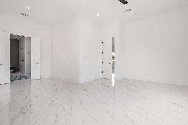 1022 Bow St, Rockwall, TX 75087 - empty room featuring recessed lighting and light marble finish floors