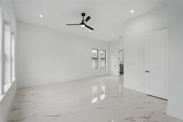 1022 Bow St, Rockwall, TX 75087 - unfurnished room featuring light marble finish flooring, recessed lighting, and a ceiling fan