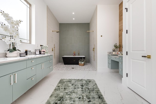1022 Bow St, Rockwall, TX 75087 - bathroom featuring vanity, tiled shower, a soaking tub, marble finish flooring, and recessed lighting