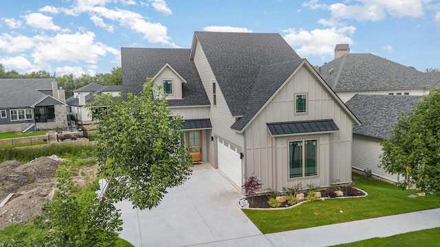 1022 Bow St, Rockwall, TX 75087 - view of front of property featuring a shingled roof, a standing seam roof, driveway, and board and batten siding