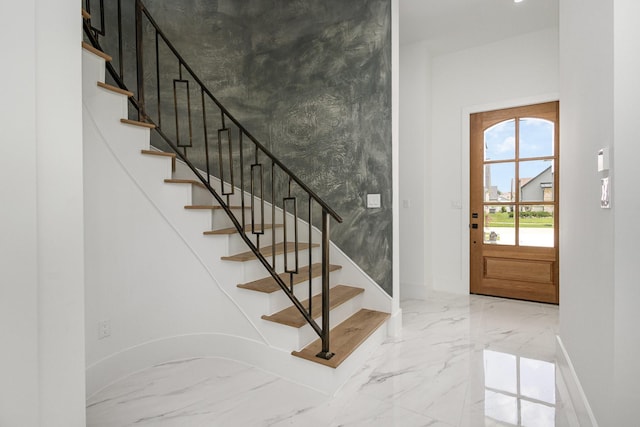 1022 Bow St, Rockwall, TX 75087 - foyer with marble tiled flooring and stairs