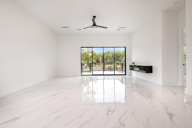 1022 Bow St, Rockwall, TX 75087 - spare room with marble tiled flooring, ceiling fan, and a smoke detector