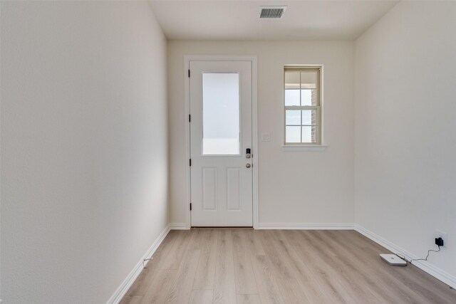 1502 Salem Dr, Forney, TX 75126 - doorway featuring light wood-type flooring and baseboards