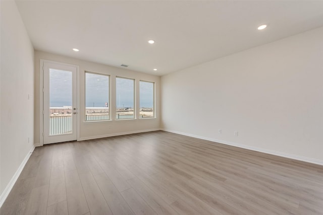 1502 Salem Dr, Forney, TX 75126 - empty room featuring wood finished floors and recessed lighting