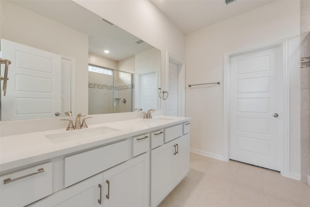 1502 Salem Dr, Forney, TX 75126 - bathroom featuring double vanity, a stall shower, and tile patterned floors