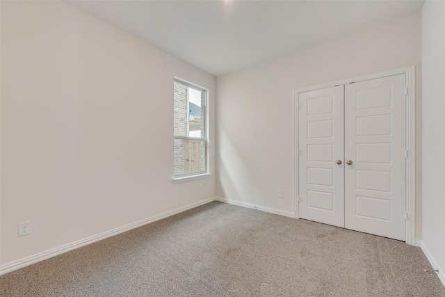 1502 Salem Dr, Forney, TX 75126 - unfurnished bedroom featuring carpet flooring and a closet