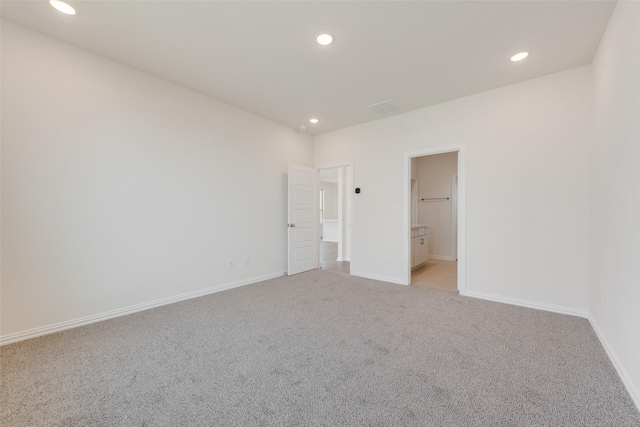 1502 Salem Dr, Forney, TX 75126 - unfurnished bedroom with light carpet, recessed lighting, and connected bathroom