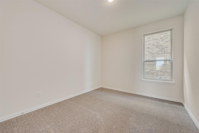1502 Salem Dr, Forney, TX 75126 - carpeted spare room featuring baseboards