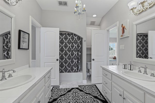 2305 Castle Creek Dr, Mansfield, TX 76063 - full bath with two vanities, a chandelier, tile patterned flooring, and shower / bath combo