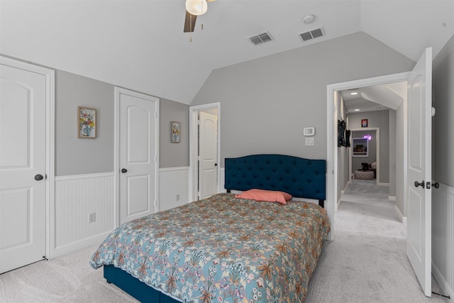 2305 Castle Creek Dr, Mansfield, TX 76063 - bedroom featuring light carpet, vaulted ceiling, a closet, and a ceiling fan