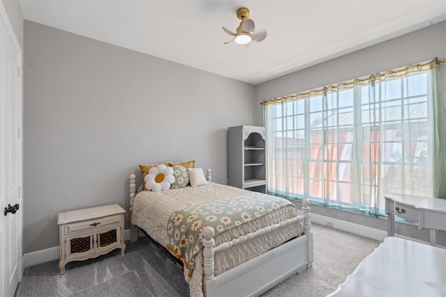2305 Castle Creek Dr, Mansfield, TX 76063 - carpeted bedroom with baseboards and ceiling fan