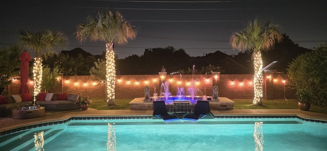 2305 Castle Creek Dr, Mansfield, TX 76063 - pool at twilight with a jacuzzi and a fenced backyard