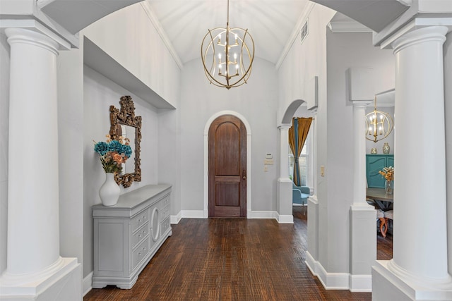 2305 Castle Creek Dr, Mansfield, TX 76063 - entryway featuring arched walkways, a chandelier, ornate columns, dark wood-type flooring, and high vaulted ceiling