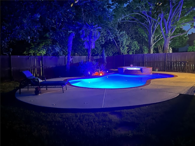 1721 Cross Point Rd, Mckinney, TX 75070 - pool at night with an in-ground hot tub, a fenced backyard, and a patio