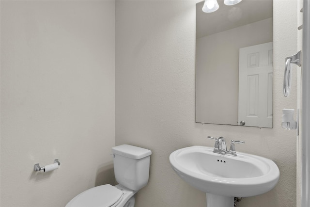 5201 Datewood Ln, Mckinney, TX 75071 - bathroom featuring a sink and toilet