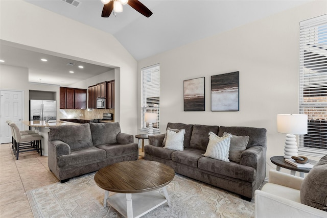 5201 Datewood Ln, Mckinney, TX 75071 - living room with a ceiling fan, recessed lighting, lofted ceiling, and light tile patterned floors