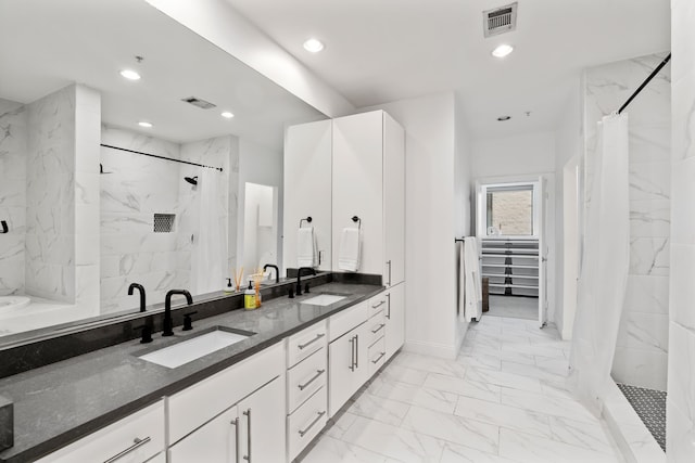 4111 Newton Ave Unit 2, Dallas, TX 75219 - bathroom featuring marble finish flooring, a marble finish shower, double vanity, and recessed lighting