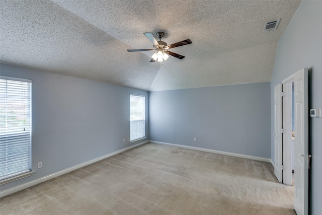 7504 Lomo Alto, Plano, TX 75024 - unfurnished room with ceiling fan, light colored carpet, and a textured ceiling