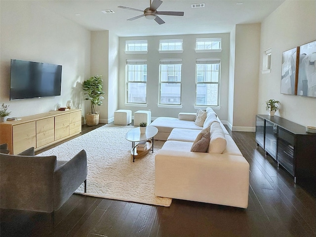 5339 Holland Ave, Dallas, TX 75209 - living room with dark wood-style flooring and a ceiling fan
