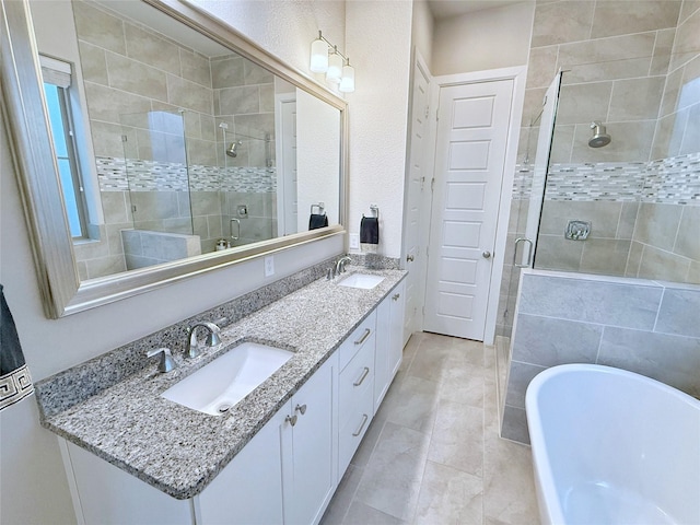 5339 Holland Ave, Dallas, TX 75209 - full bathroom featuring a shower stall, a freestanding tub, and double vanity