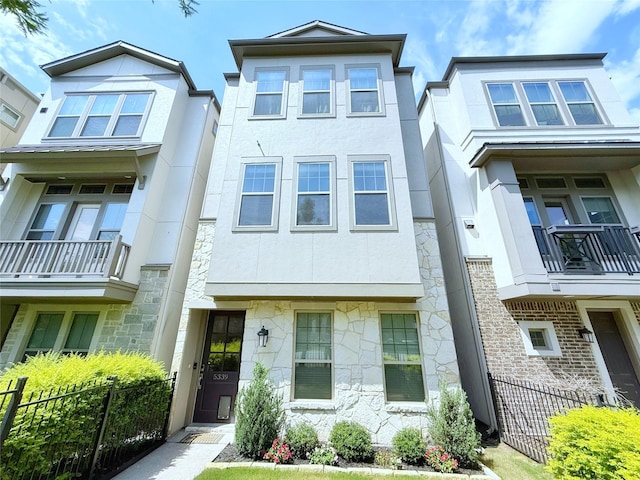 5339 Holland Ave, Dallas, TX 75209 - townhome / multi-family property featuring stucco siding and stone siding