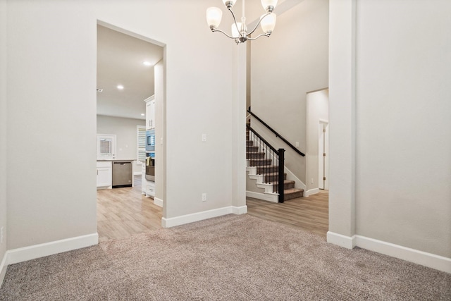 3680 Twin Pines Dr, Grand Prairie, TX 76065 - unfurnished room with light colored carpet, a chandelier, stairs, recessed lighting, and light wood finished floors