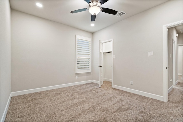 3680 Twin Pines Dr, Grand Prairie, TX 76065 - unfurnished bedroom with light colored carpet, a walk in closet, ceiling fan, recessed lighting, and a closet