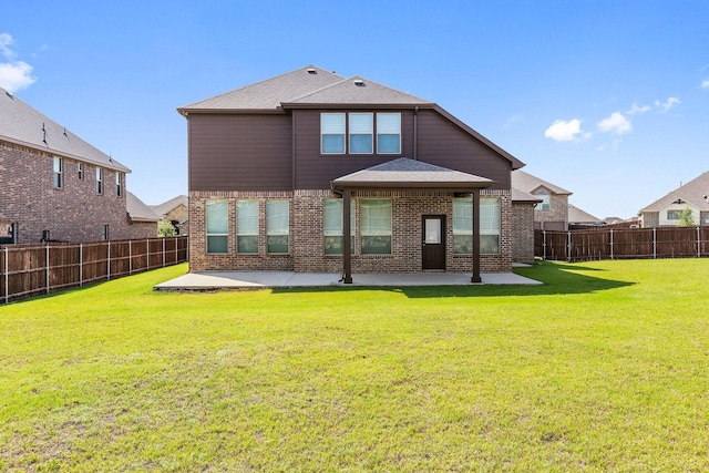 3680 Twin Pines Dr, Grand Prairie, TX 76065 - rear view of house with a patio area, a fenced backyard, and brick siding