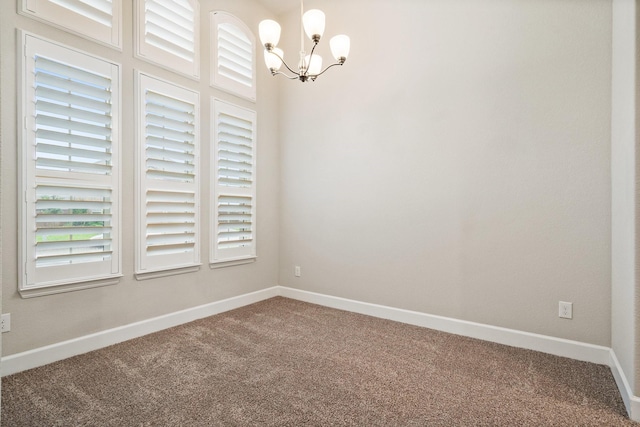 3680 Twin Pines Dr, Grand Prairie, TX 76065 - carpeted spare room with a chandelier and baseboards