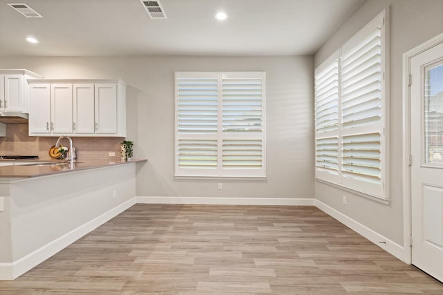 3680 Twin Pines Dr, Grand Prairie, TX 76065 - unfurnished dining area with light wood-style flooring and recessed lighting