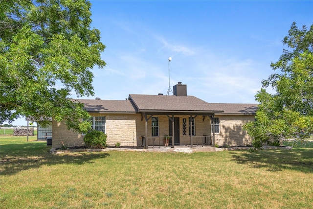 10900 Fm 1189, Lipan, TX 76462 - back of property with a yard, stone siding, a chimney, covered porch, and a shingled roof