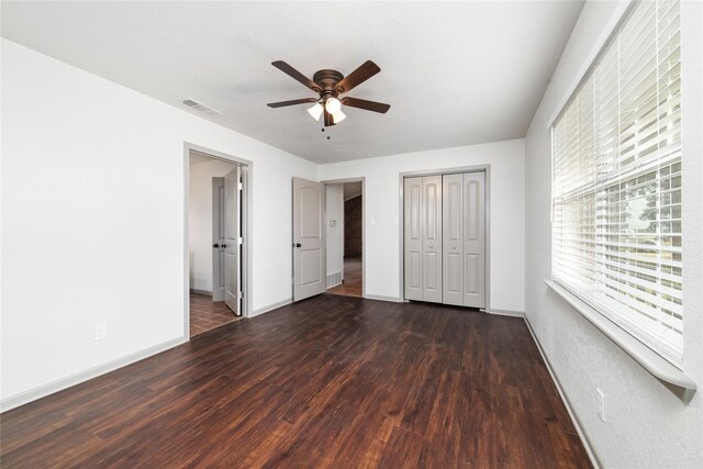 10900 Fm 1189, Lipan, TX 76462 - unfurnished bedroom featuring wood finished floors, a closet, and a ceiling fan