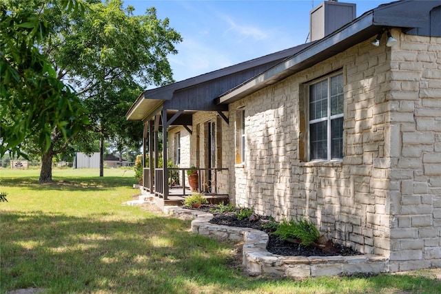 10900 Fm 1189, Lipan, TX 76462 - view of home's exterior with a lawn and a chimney