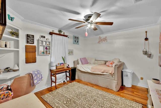 112 Rolling Meadow Ln, Bossier City, LA 71112 - bedroom with ornamental molding, wood finished floors, and ceiling fan