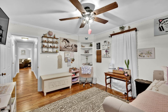 112 Rolling Meadow Ln, Bossier City, LA 71112 - living area with crown molding, ceiling fan, and light wood-type flooring