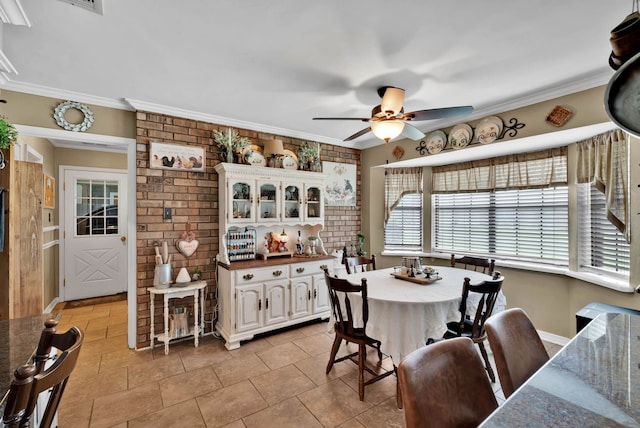 112 Rolling Meadow Ln, Bossier City, LA 71112 - dining space featuring ceiling fan, ornamental molding, and brick wall