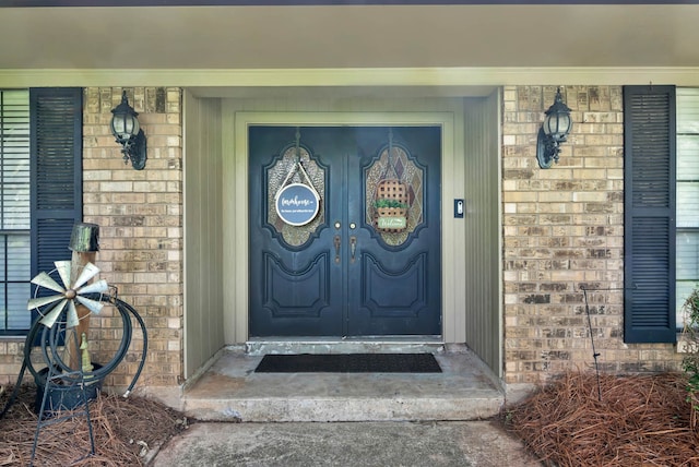 112 Rolling Meadow Ln, Bossier City, LA 71112 - view of exterior entry with brick siding and a porch