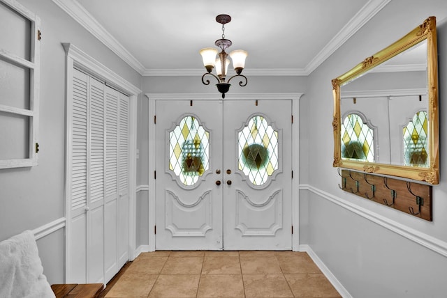 112 Rolling Meadow Ln, Bossier City, LA 71112 - entrance foyer with a chandelier, light tile patterned floors, crown molding, and french doors