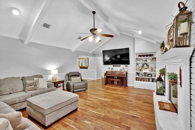 112 Rolling Meadow Ln, Bossier City, LA 71112 - living room with light wood-style flooring, ceiling fan, and built in shelves