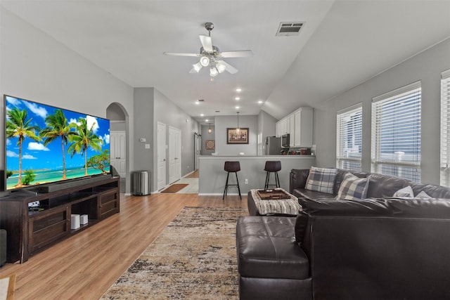 1732 Jasmine Trl, Savannah, TX 76227 - living room with light wood finished floors, a ceiling fan, and lofted ceiling
