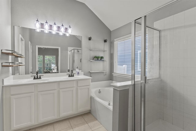 1732 Jasmine Trl, Savannah, TX 76227 - full bath featuring vaulted ceiling, a stall shower, a garden tub, double vanity, and tile patterned flooring
