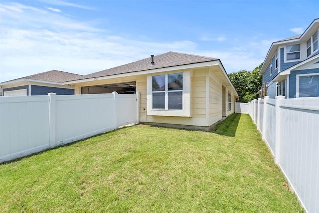 1732 Jasmine Trl, Savannah, TX 76227 - rear view of house featuring a fenced backyard, an attached garage, and a shingled roof