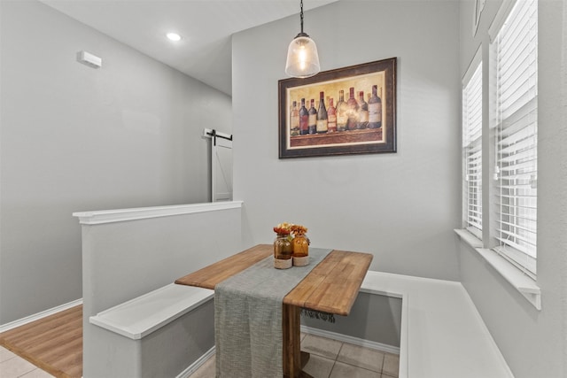 1732 Jasmine Trl, Savannah, TX 76227 - dining room with a barn door, plenty of natural light, and recessed lighting