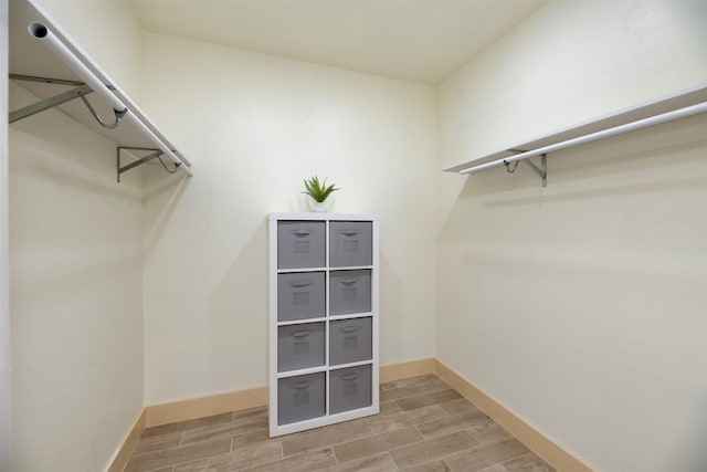 2621 Canton Dr, Fort Worth, TX 76112 - spacious closet featuring wood finish floors